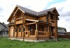 Строительство домов из оцилиндрованного бревна: преимущества и особенности