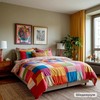 Большая спальная комната в квартире, постель заправлена разноцветным бельем с картинками
