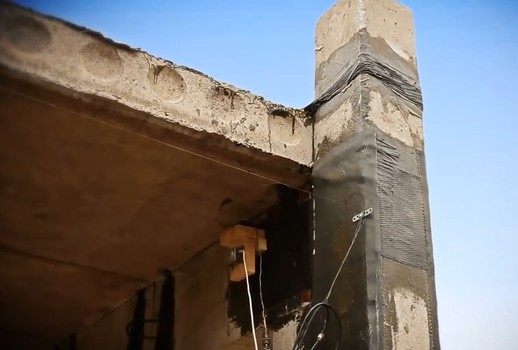 Испытания балок и колонн, усиленных углеволокном, кадр из фильма холдинга Композит