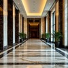 Фойе бизнес-центра, оформленное мрамором на полу и стенах