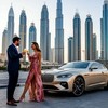 Парень и девушка пьют шампанское рядом с дорогим автомобилем на фоне небоскребов Дубая